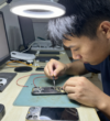 magnific_a-focused-technician-fixi_3G9LhaZREY
